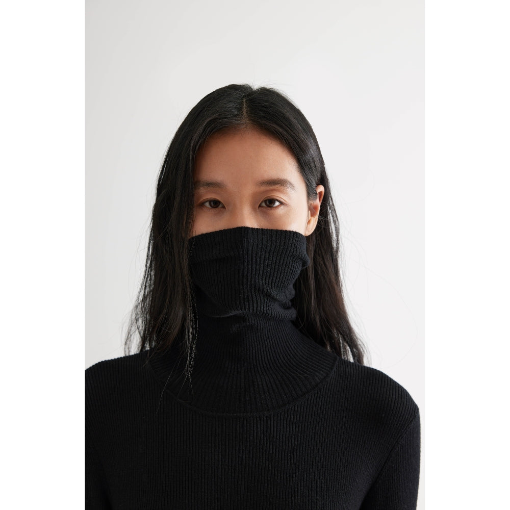Geometric asymmetric turtleneck knit dress